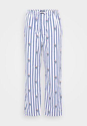 Weiße Baumwollhose mit vertikalen blauen Streifen, die ein sich wiederholendes Bärenmuster zeigen. Elastischer Bund und entspannter Schnitt.