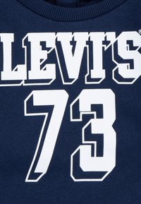 Levi's® VARSITY SET - Pantalones deportivos - dress blues