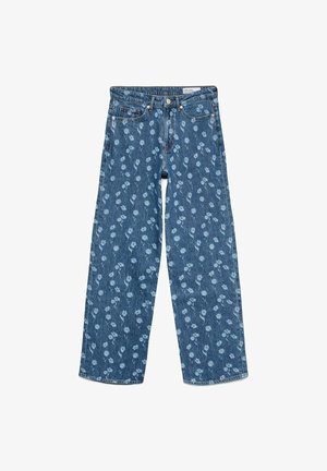 Sinised teksapüksid, millel on helesinine lillemustriline disain. Omavad sirge säärega lõiget, traditsioonilist viie taskuga stiili ja metallist riistvara.