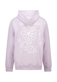 Vaalean lilac huppari, jossa on valkoinen graafinen kukka- ja tanssijakuva selässä. Materiaalin näyttää olevan pehmeä ja se on standardikokoinen.