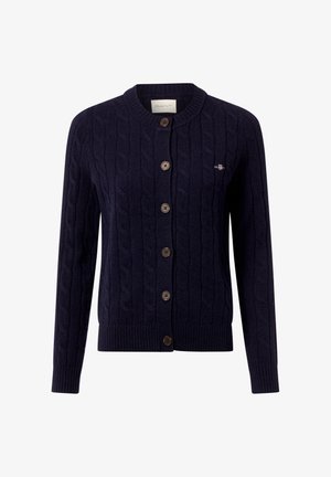 Navy blue cable-knit cardigan made of soft fabric, featuring a round neckline, five brown buttons, and a subtle logo on the chest.