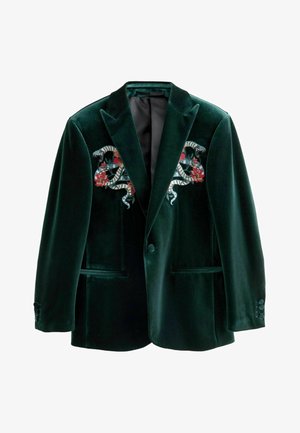 Blazer verde din catifea cu broderie de șarpe și flori pe piept. Are închidere cu două nasturi și două buzunare frontale. Textură netedă.