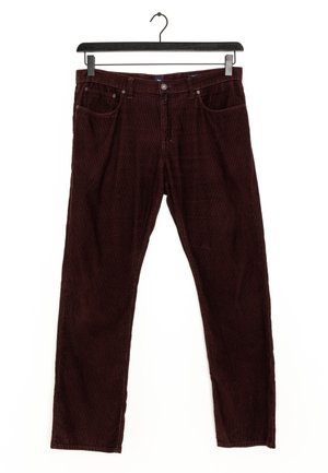 Pantalon en velours côtelé brun foncé suspendu à un cintre noir avec bouton frontal, fermeture éclair et design à cinq poches, présenté sur un fond blanc.