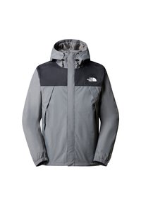 Veste de pluie à capuche gris clair et noir avec fermeture éclair à l'avant et logo The North Face sur la poitrine.