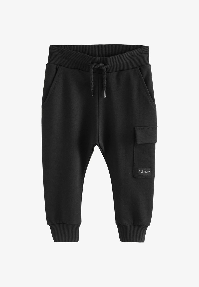 Pantalon jogger noir pour tout-petit avec taille élastique, cordon de serrage, poches latérales, poignets côtelés et une poche à rabat avec une petite étiquette sur la jambe droite.