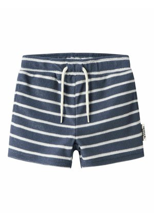 Short pour tout-petit rayé bleu marine et blanc avec cordon blanc ajustable et petite étiquette latérale sur la ceinture.