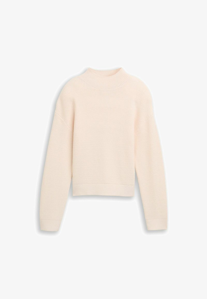 Pull en maille côtelée beige clair avec un col haut, des épaules tombantes et des manches longues. Tissu texturé avec une coupe ample et courte.