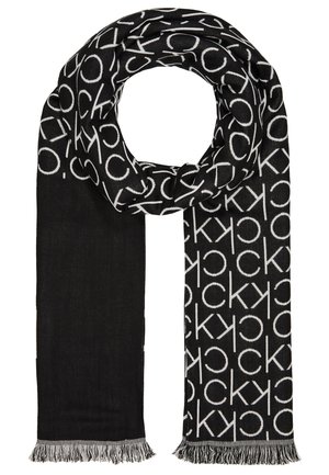 Black scarf with fringe, featuring a repeating white "CK" logo pattern on one side and solid black on the other side.