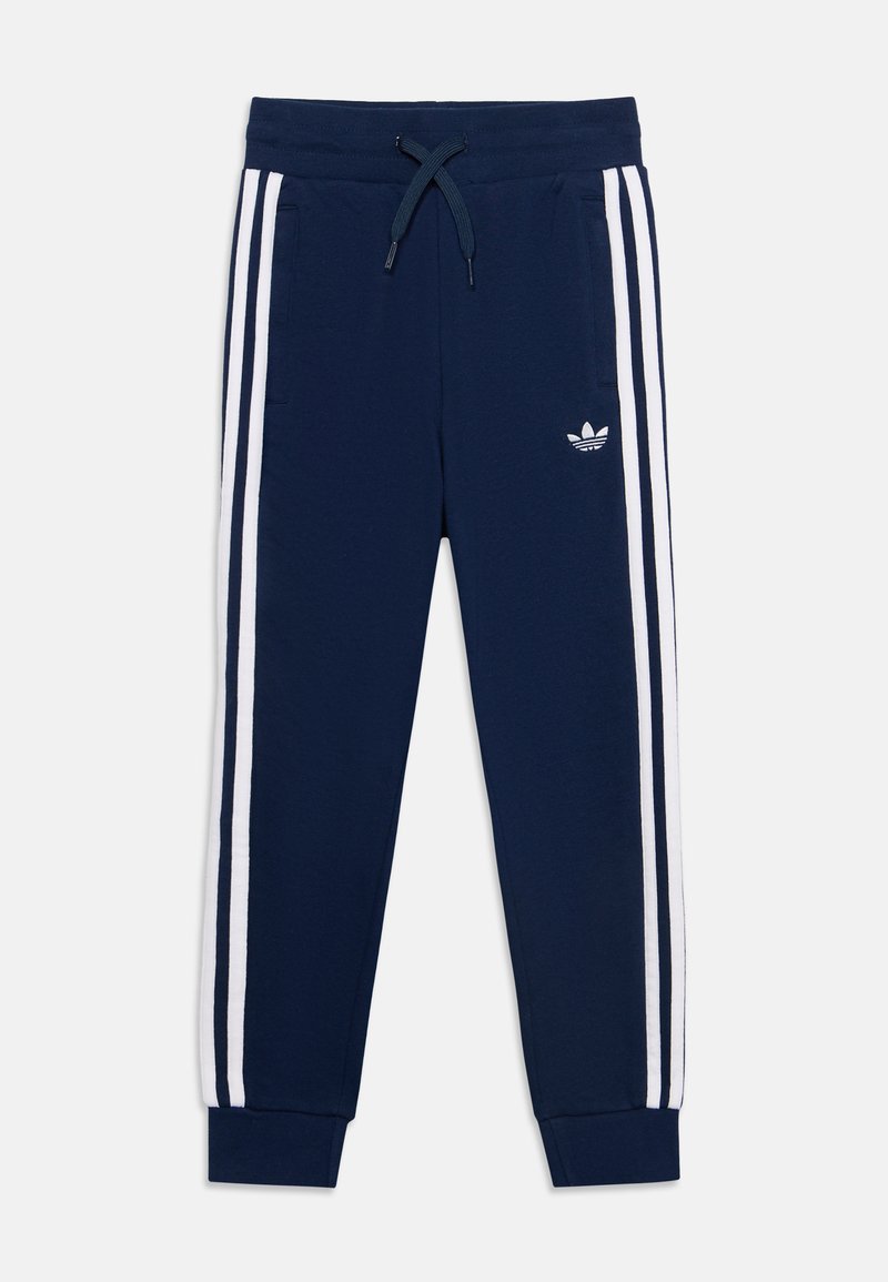 Σκούρο μπλε αθλητική φόρμα Adidas με λευκές πλευρικές ρίγες, ελαστική μέση με κορδόνι, μπροστινές τσέπες και ριμπ μανσέτες.