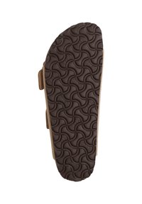 Semelle en caoutchouc marron avec un motif en vagues, dotée d'un avant plus large et d'un arrière effilé. Fabriquée en matériau souple, conçue pour le confort et le soutien.