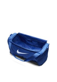 Blauwe Nike sporttas met een groot compartiment, een interne ritszak en een opvallend wit logo. Gemaakt van duurzaam stof met een vlakke bodem.