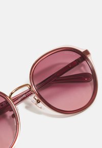 COACH Ochelari de soare - transparent/berry