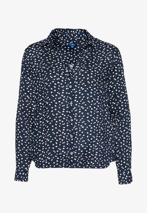 Marineblauwe blouse met knopen, lange mouwen en een klein wit-roze bloemenpatroon.