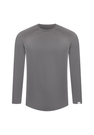 Long-sleeve shirt in solid gray fabric, featuring a round neckline, raglan sleeves, and a slightly curved hem with understated stitching details.