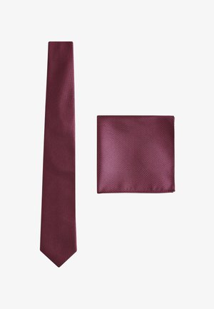 Burgundy tie and pocket square set, textured fabric with a subtle diamond pattern, smooth finish, and clean edges.