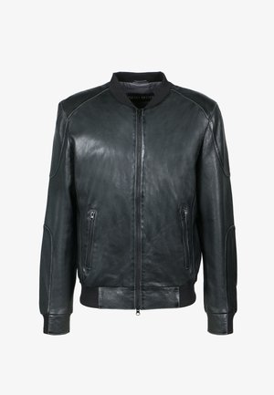Veste bomber en cuir noir avec fermeture éclair à l'avant, finitions côtelées aux poignets et poches latérales. Texture lisse et coupe ajustée avec des détails de couture contrastants.