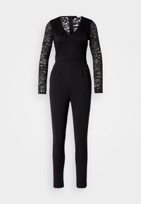 Svart jumpsuit med en långärmad topp i spets och en V-ringning, tillsammans med smala byxor med en mjuk textur och framfåror.