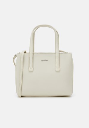 Calvin Klein MUST MINI TOTE - Handtas - dark ecru