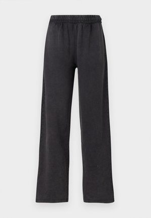 Black, wide-leg pants with an elastic waistband, made of soft fabric. Smooth texture with a loose fit and no visible pockets or hardware.