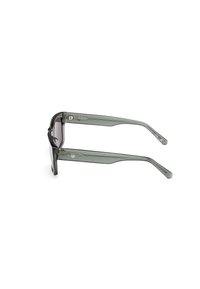 Ochelari de soare cu ramă din plastic transparent gri și lentile nuanțate. Au brațe drepte cu accente geometrice și elemente metalice.