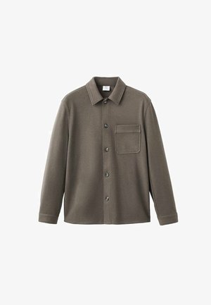 Olive green button-up shirt made of textured fabric; features a collar, long sleeves, and a chest pocket with a narrow flap.