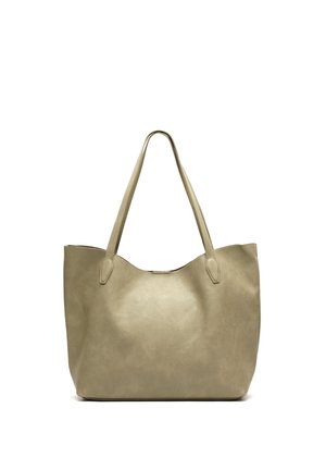 Beige leather tote bag with two long handles, smooth texture, and a slightly curved top edge.