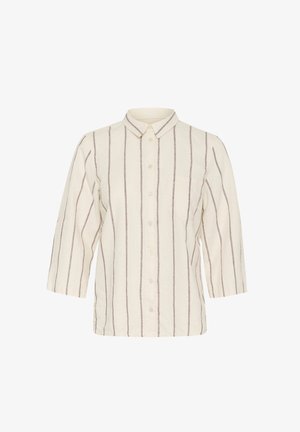 Heled beezhi särgid, millel on õhukesed pruunid vertikaalsed triibud, krae ja rinnatasku; omab kolmandiku pikkusega varrukaid ja vabamat lõiget.