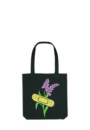 Zwarte tote bag met geborduurde paarse bloemen en een ontwerp van een gele pleister. Stevige stof met twee lange handvatten om te dragen.