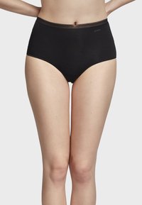Culotte noire taille haute en tissu lisse, avec une taille accentuée de dentelle et un design classique.