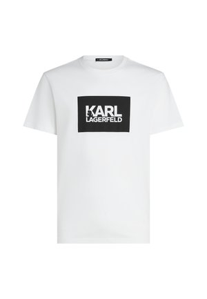 T-shirt en coton blanc avec un graphique rectangulaire noir portant "KARL LAGERFELD" en texte blanc en gras. Design à manches courtes et col rond.