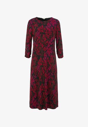 Bloemendress van lichtgewicht stof, met een zwarte basis en levendige rode en roze patronen, 3/4 mouwen en een ronde halslijn.