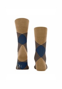 Due paia di calzini corti presentano un motivo a diamante in tonalità di marrone, beige e blu navy, mostrando un design elegante e moderno.