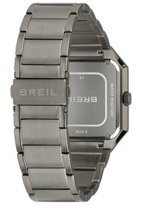 Stålur med børstet metalarmbånd og oktagonal kasse. Grå urskive med indgraverede detaljer "Breil" og "Vandafvisende".