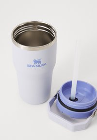 Stainless steel insulated tumbler in soft lavender with a silver rim, accompanied by a matching purple lid and clear straw.
