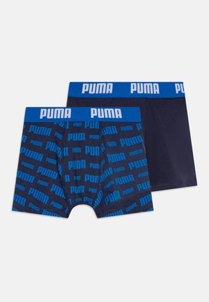 Boxer-briefs bleus et navy avec un motif de logo imprimé. La ceinture élastique présente "PUMA" en blanc. Matériau en coton doux et extensible.