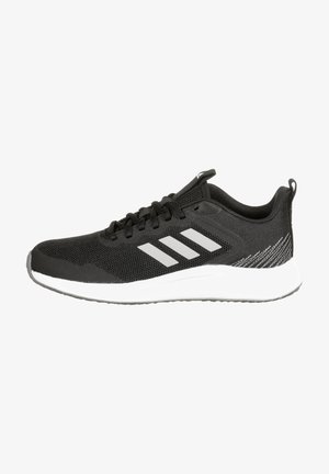 Black athletic shoe with mesh upper, featuring three grey stripes and a textured white sole. Designed for comfort and breathability.