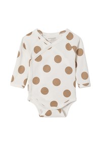 Langärmeliger Babybody aus crèmefarbenem Baumwollstoff mit großen braunen Punkten, Wickeldesign und Druckknöpfen am Boden und an der Seite.