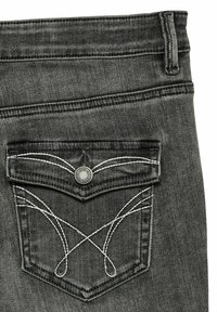 Gray denim jeans featuring a back pocket with decorative white stitching and a metal button. Texture is smooth with a slightly faded finish.