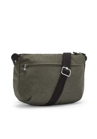Olive green nylon shoulder bag with a zip pocket, black adjustable strap, and textured surface. Rounded shape with minimal hardware.