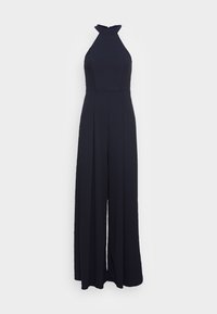 Marinblå jumpsuit med halterneck och figursydd midja, med vida byxor och plisseringar för extra textur. Slät tygfinish.