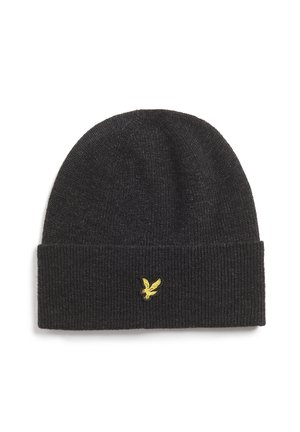 Bonnet en tricot noir avec une texture ribbed et un revers replié. Présente un petit logo brodé jaune d'un oiseau à l'avant.