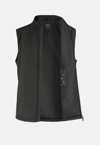 Gilet sans manches noir avec un col haut, doté d'une fermeture éclair sur le devant, d'une texture lisse et d'une étiquette intérieure affichant les instructions d'entretien.