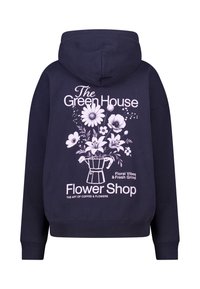 Sweat à capuche marine avec un grand graphique floral au dos montrant des fleurs blanches et roses et le texte "The Green House Flower Shop."