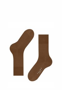Calzini di cotone marroni con polsini a coste e una texture liscia, con il nome del marchio stampato in bianco sulla suola.