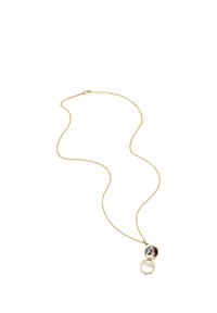Gold chain necklace with open round locket showing a photo of two people on one side and a mirror on the other side.