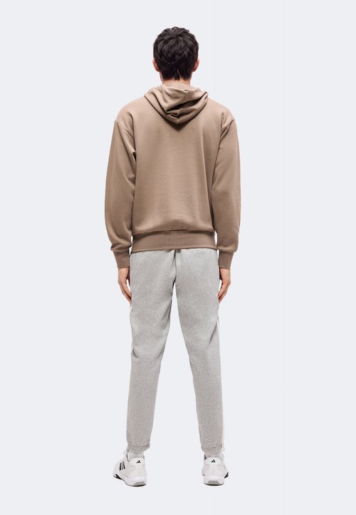 adidas ESSENTIALS 3 STRIPES TAPERED CUFFED PANTS - Tracksuit bottoms - medium grey heather/white — photo 3