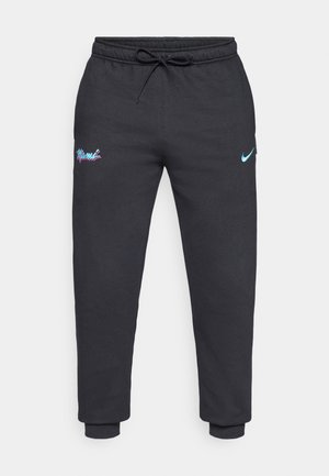 Fekete melegítőnadrág puha anyagból, húzózsinórral a deréknál, rugalmas mandzsettákkal és "Miami" logóval lila és kék színekben; Nike logó világoskék színben.