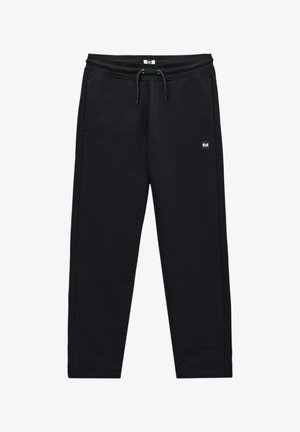 Pantalon de survêtement noir avec cordon de serrage, poches latérales et petit patch logo rectangulaire sur la partie supérieure de la cuisse gauche.
