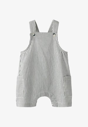 Tutina bianca per bambini con sottili righe verticali nere, spalline regolabili con bottoni e due tasche frontali con righe orizzontali.