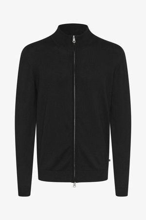 Melnā zip-up kardigāna ar augstu apkakli, izgatavots no gluda adījuma auduma. Iezīmē sudraba rāvējslēdzis un pieguļoši piedurknes, piedāvājot elegantu siluetu.